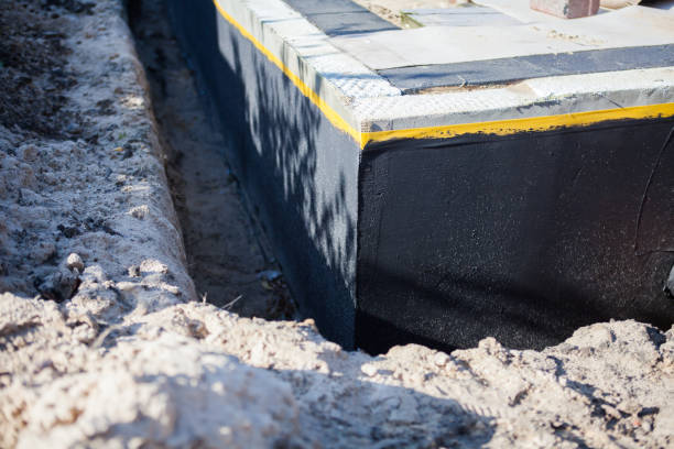 Professional Emergency Waterproofing technician working in Ashton, MD